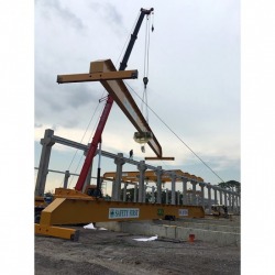 Install a crane to lift a large factory.